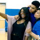 Jacqueline Cruz, right, is shown with her son Karl Anthony Towns and his girlfriend India Gentry before the 2015 NBA Draft. Cruz died on Monday due to complications from COVID-19.
